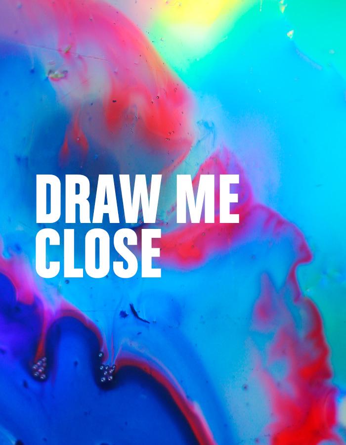 Draw Me Close title treatment on a colourful background that looks like a multicolour oil spill