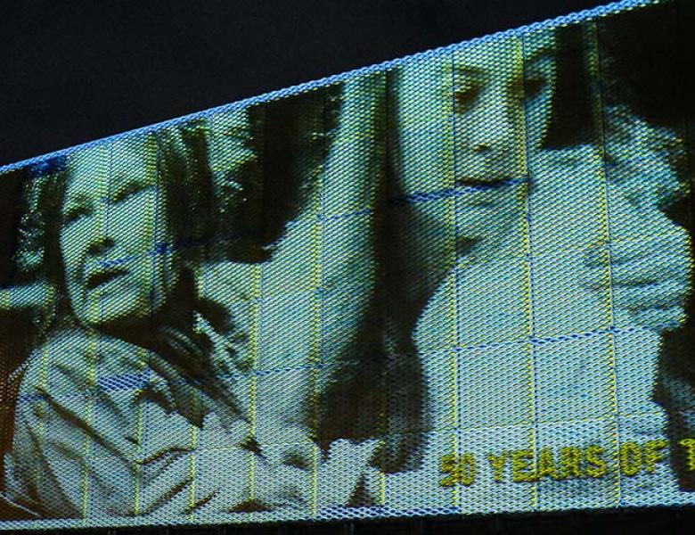 A photo of Judi Dench and Niamh Cusack in Sam Mendes’ 1991 revival of The Plough and the Stars in projected on the Young Vic