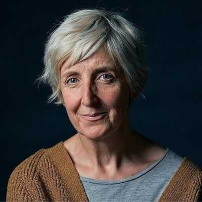 A headshot of Julie Hesmondhalgh