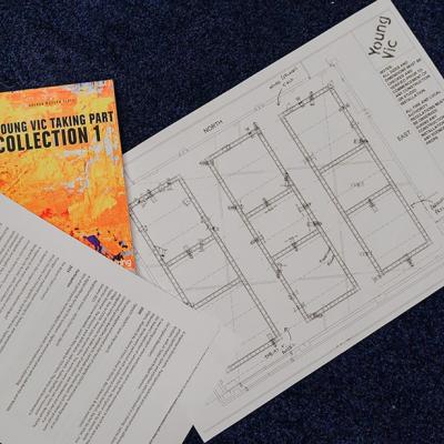 Some documents from the Young Vic archive, including an orange leaflet reading 'Young Vic Taking Part Collection 1' and an architect's drawing of a room