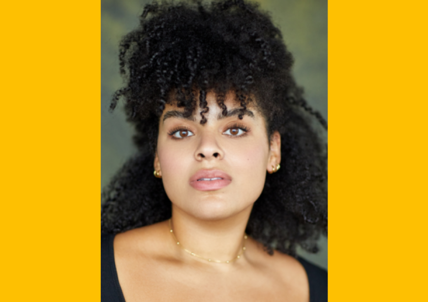 A headshot of a mixed race girl.