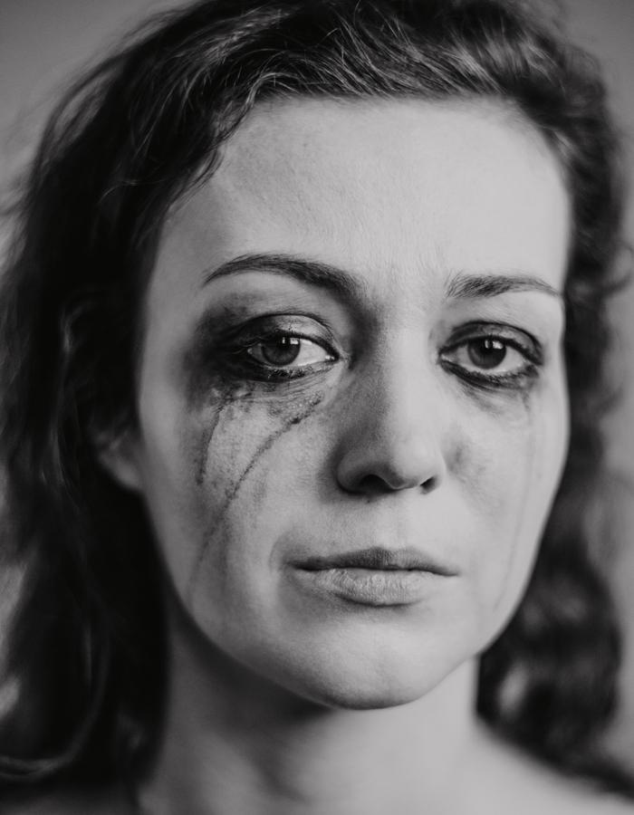 Woman with running mascara